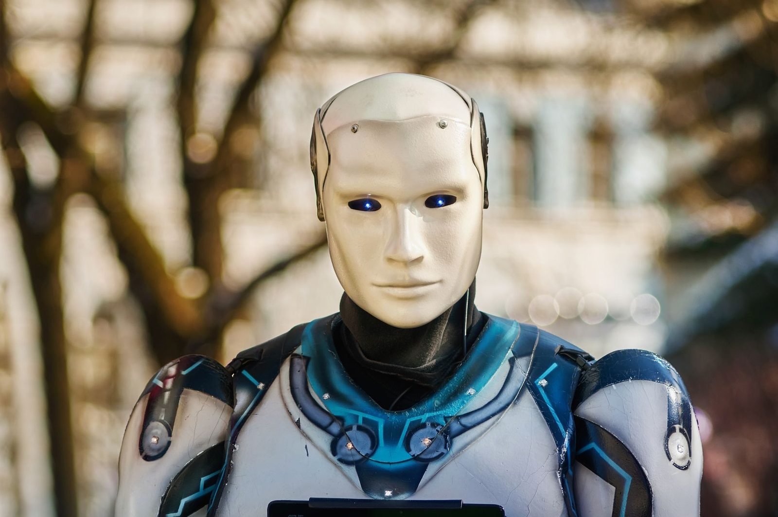 A futuristic humanoid robot in an indoor Tokyo setting, showcasing modern technology.