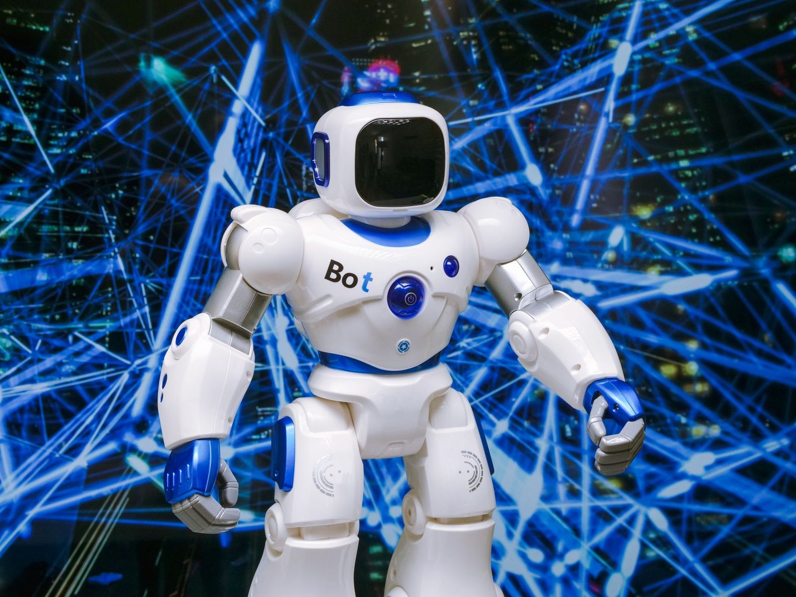 A futuristic humanoid robot in an indoor Tokyo setting, showcasing modern technology.